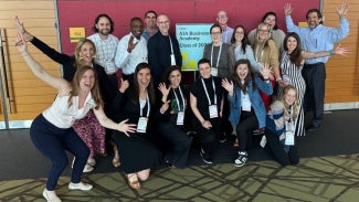 Group of people celebrating the launch of Business Academy program